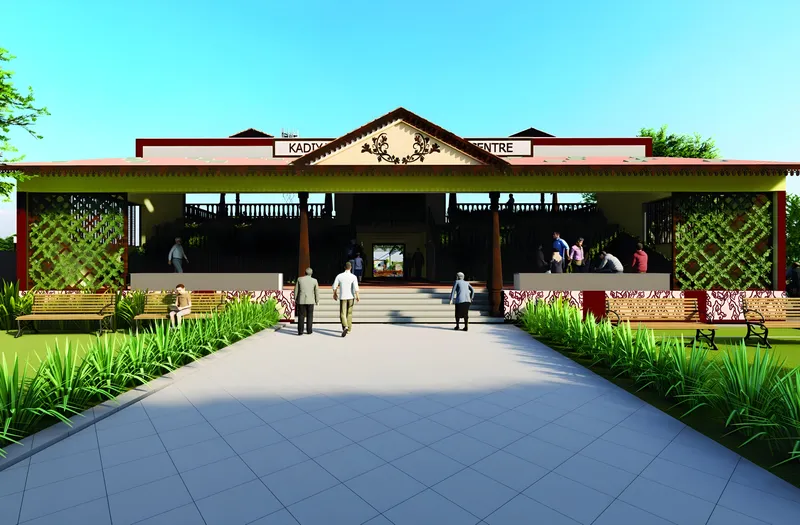 The front of the Kadiyam Experience Centre: a tiled-roof pavilion with lattice panels at the end of a planted walkway